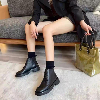 Bottes noires en cuir première couche 2