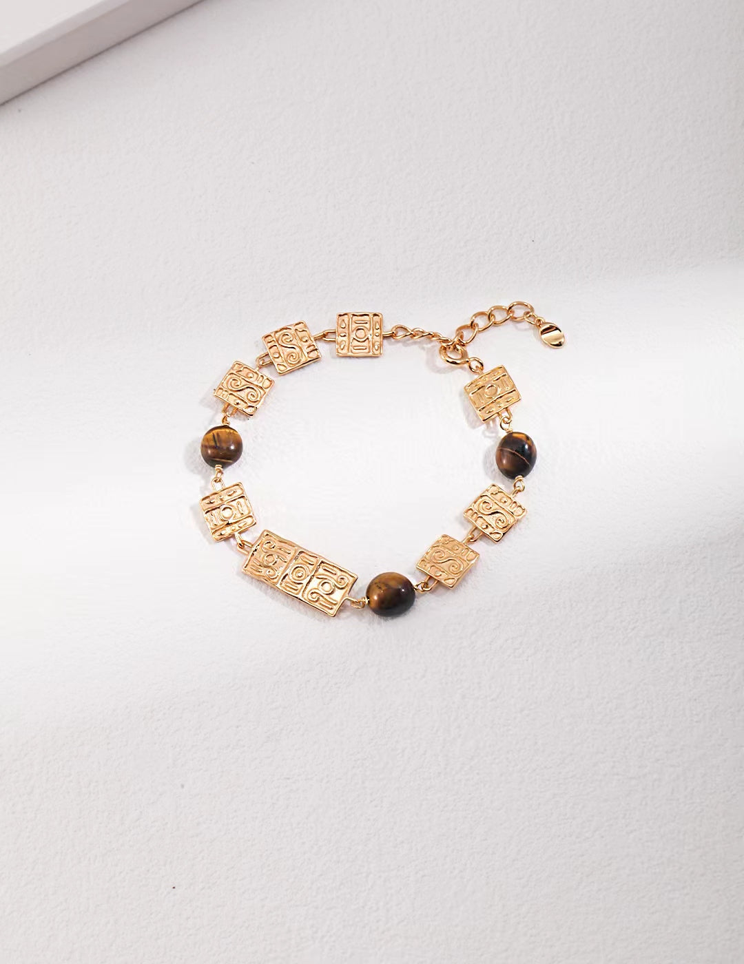 Gold Charms and Mahogany Stones Plated Bracelet